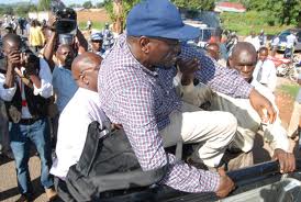 Besigye charged, re-arrested
