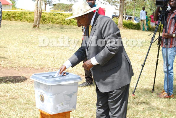 NRM presidential candidate Yoweri Museveni casts his vote at Kaaro polling station on Thursday. PHOTO BY COLLEB MUGUME