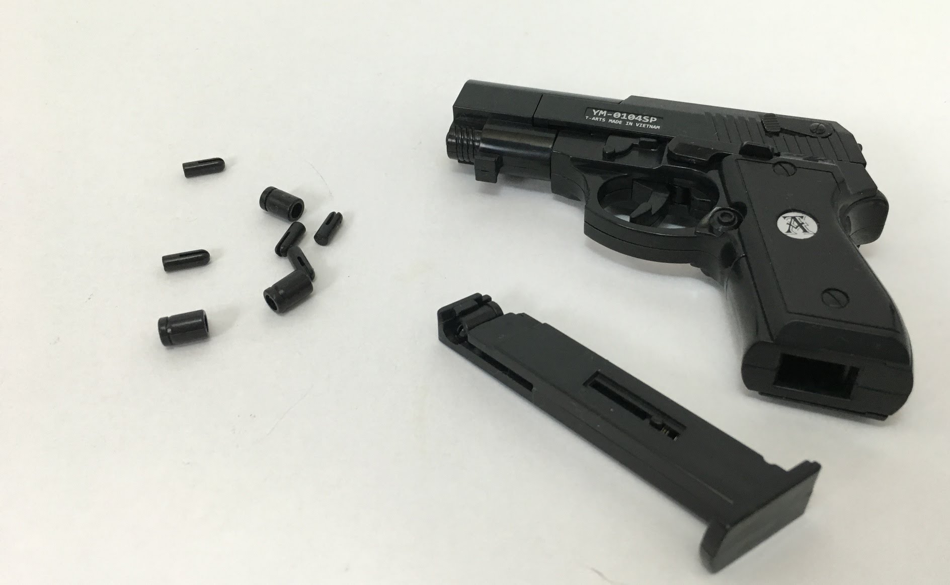 Man held over toy pistol