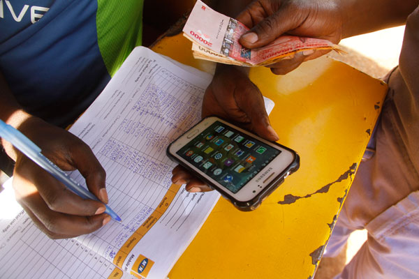 Controversial tax imposed on mobile money & social media passed