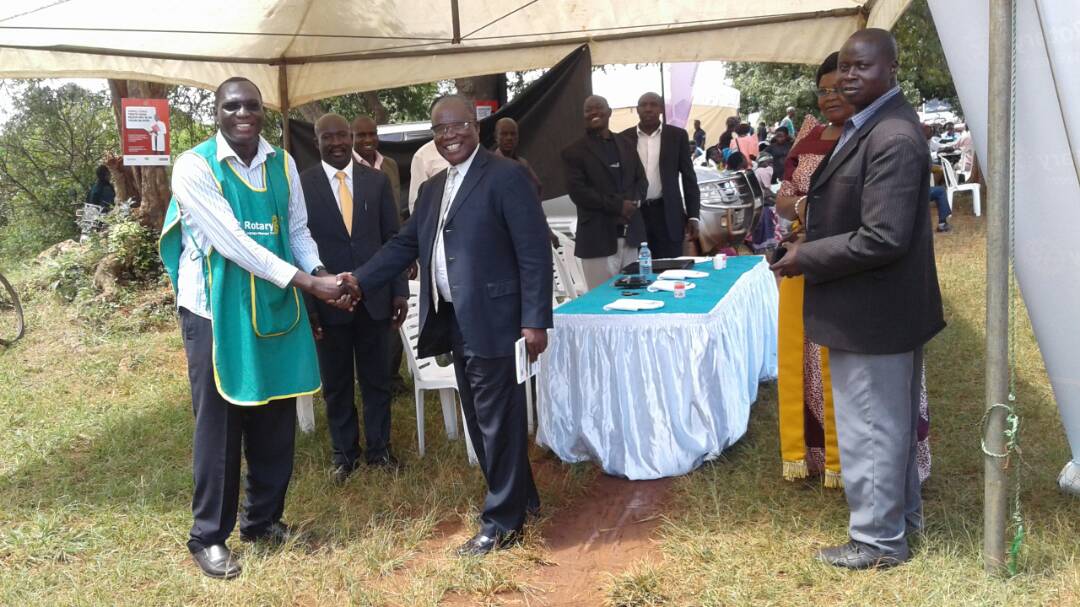 Minister Muluuri Mukasa commends Rotary for helping improve the health sector
