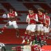 Arsenal beat 10-man Tottenham, Man Utd hold off West Ham