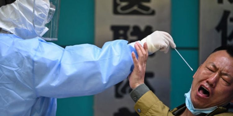 China threatens to ban unvaccinated adults from schools, hospitals