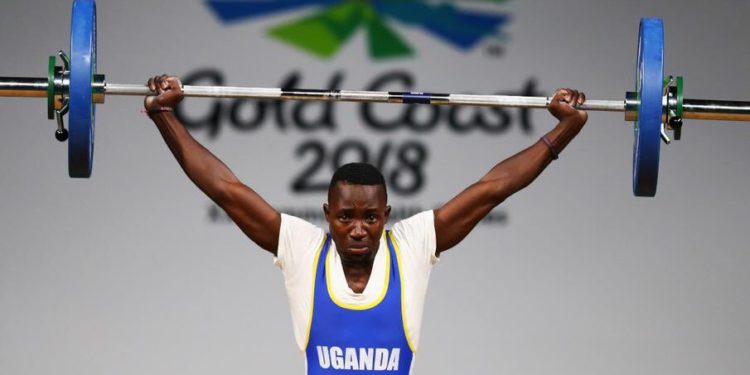 Ugandan weightlifter missing as Tokyo marks week to Covid-hit Olympics