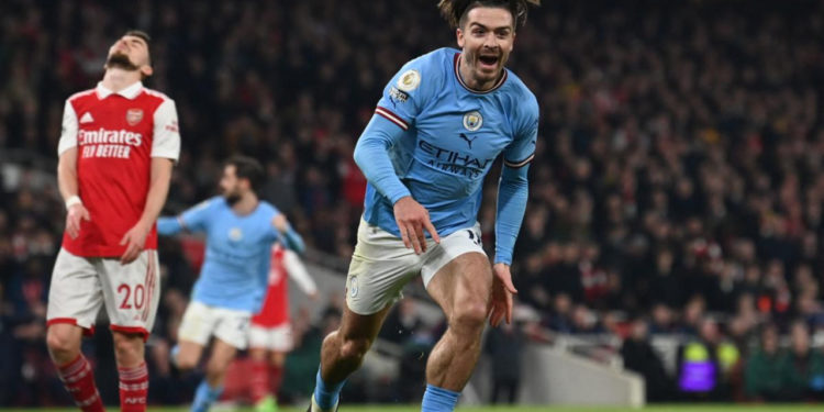 Man City sink Arsenal to seize top spot in title race
