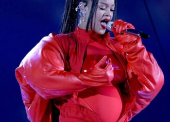 Rihanna performs hits at Super Bowl, reveals baby bump