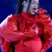 Rihanna performs hits at Super Bowl, reveals baby bump
