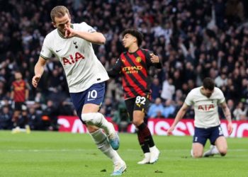 Kane becomes Spurs’ record scorer as Man City suffer title blow