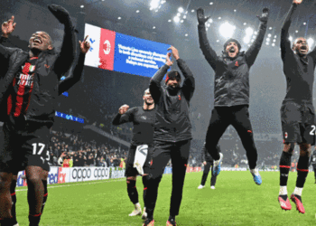 Milan hold off toothless Tottenham to reach Champions League quarters
