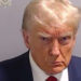 Trump arrested in election case, mug shot released