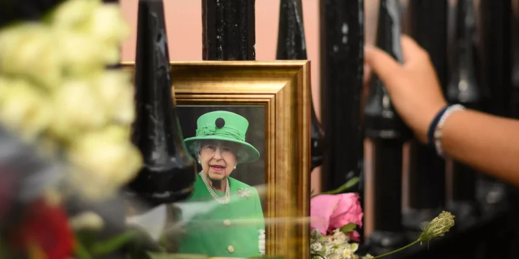 Gun salutes and reflection as UK remembers Queen Elizabeth II