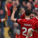 Salah double downs 10-man Everton in controversial Merseyside derby