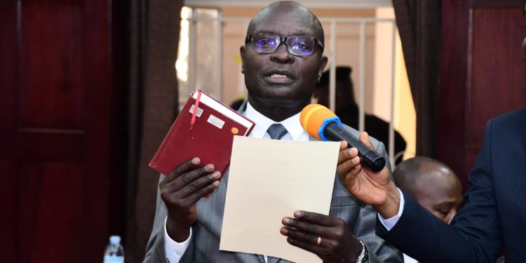 Byabakama sworn in as EC boss