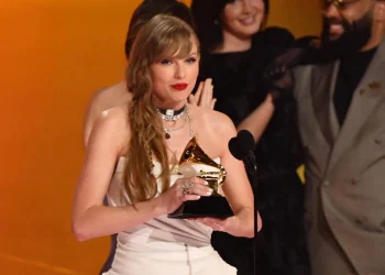 Taylor Swift wins Album of the Year Grammy, breaking record